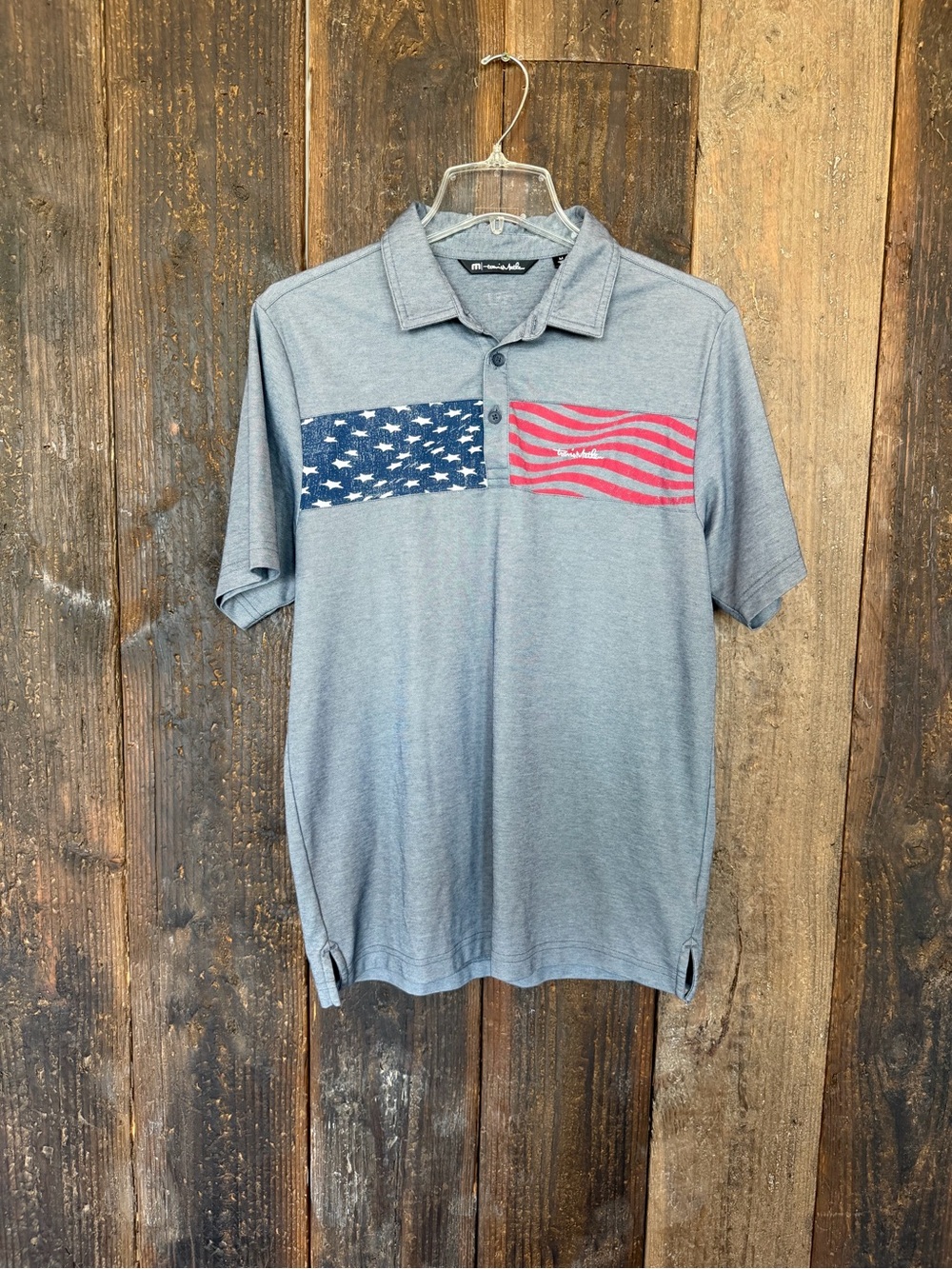 Travis Mathew’s Men's Gray Golf Polo with American Flag Chest Panels